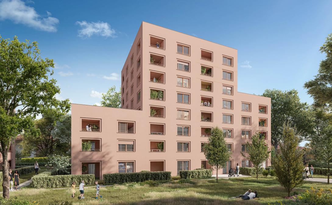 résidence couleur brique avec espaces verts 